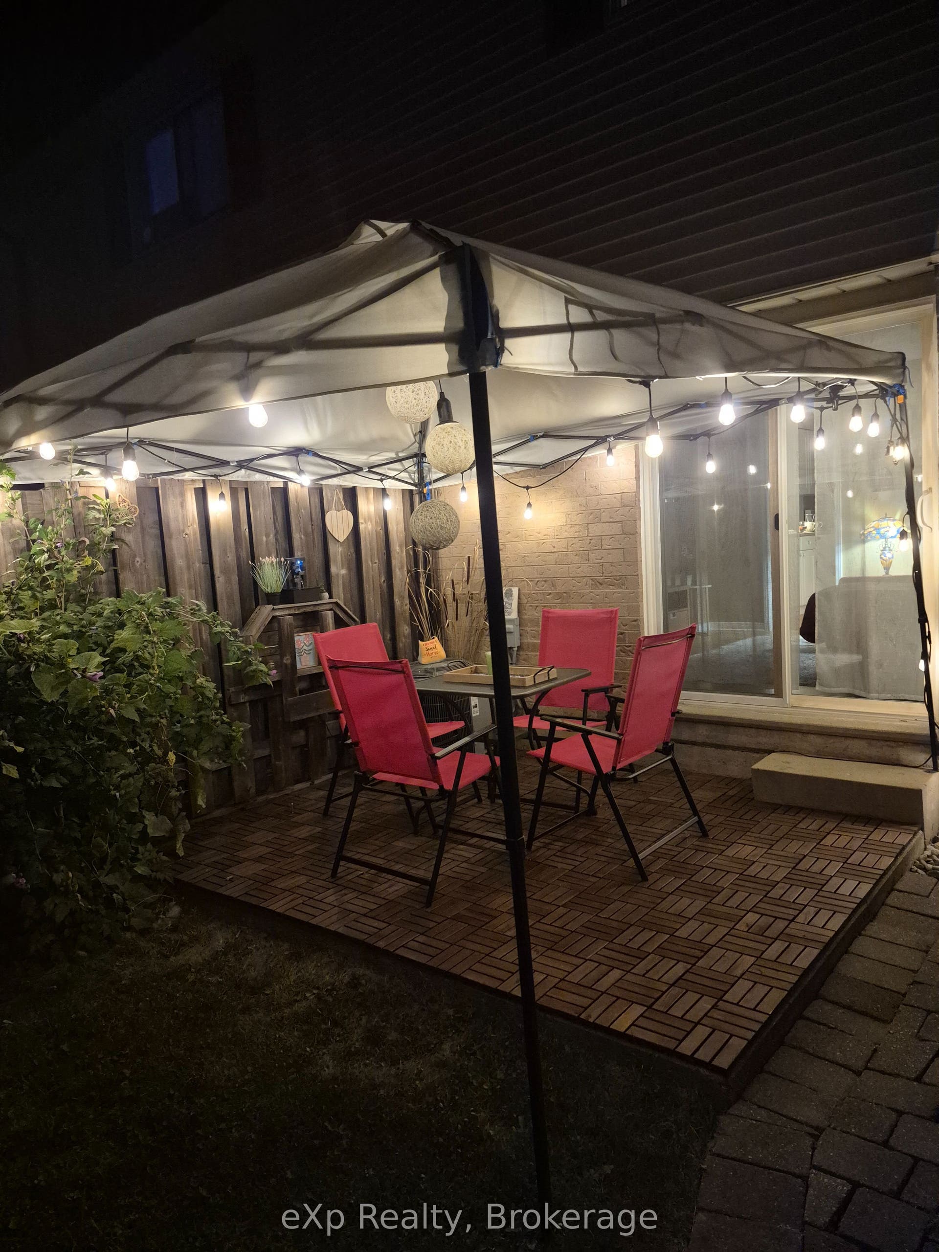 40 Silvercreek Parkway N, #44, Guelph, Wellington ON N1H 7X5 Patio at night - all items for sale