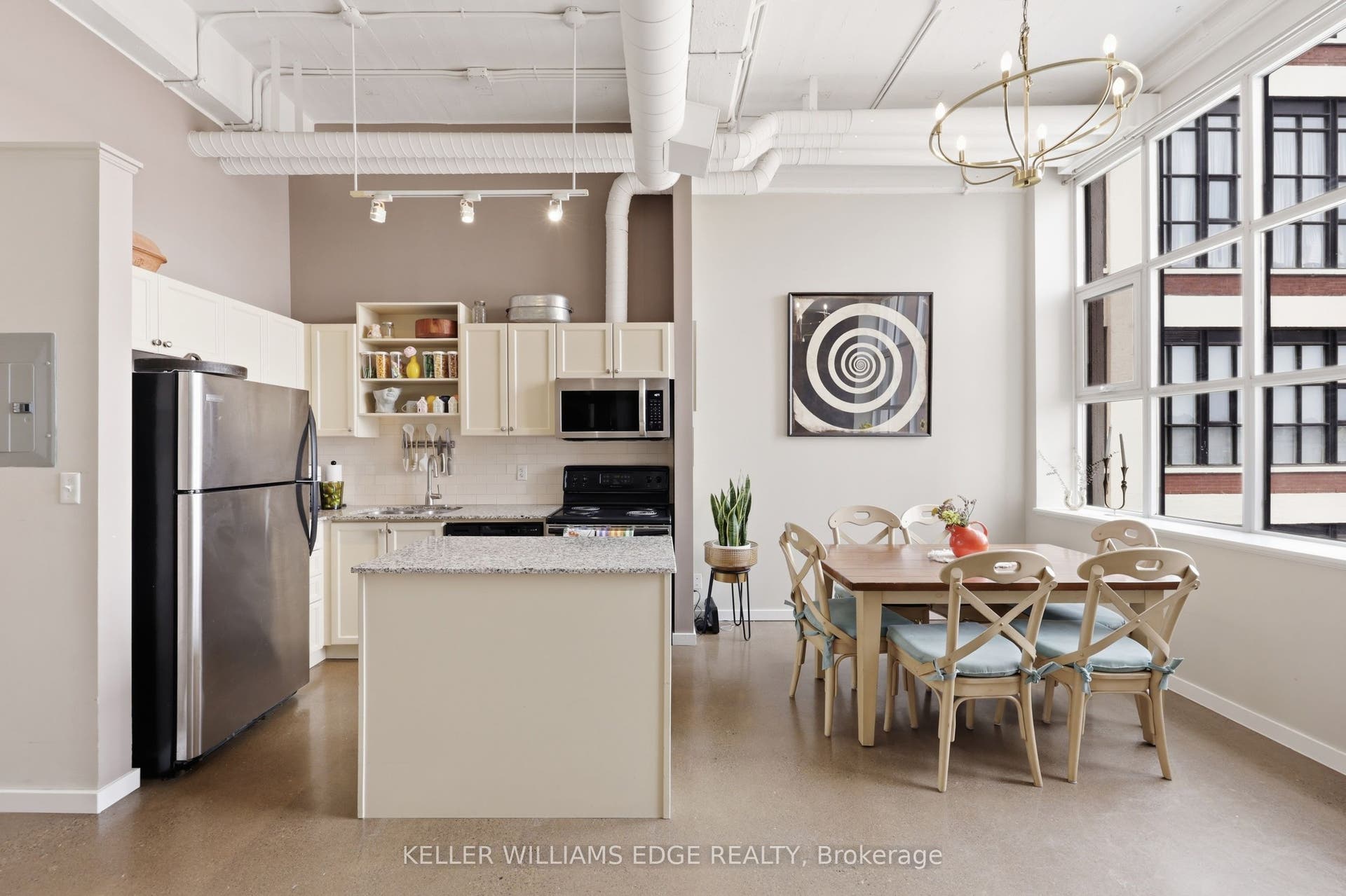 410 King Street W, #307, Kitchener, Waterloo ON N2G 1C3 Open Concept Kitchen & Dining w/natural sunlight.