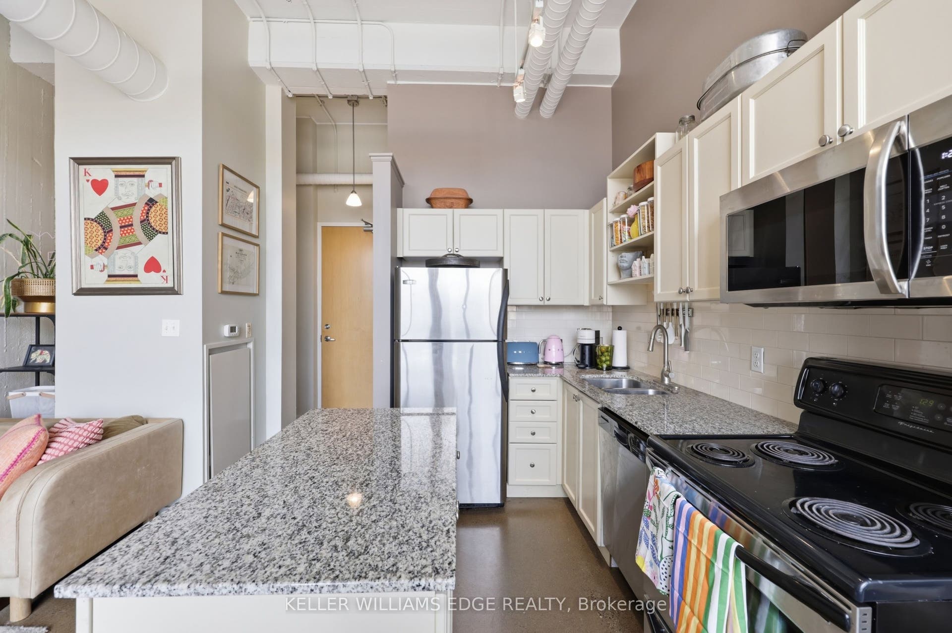 410 King Street W, #307, Kitchener, Waterloo ON N2G 1C3 Kitchen with Island and Stainless Steel Appliances