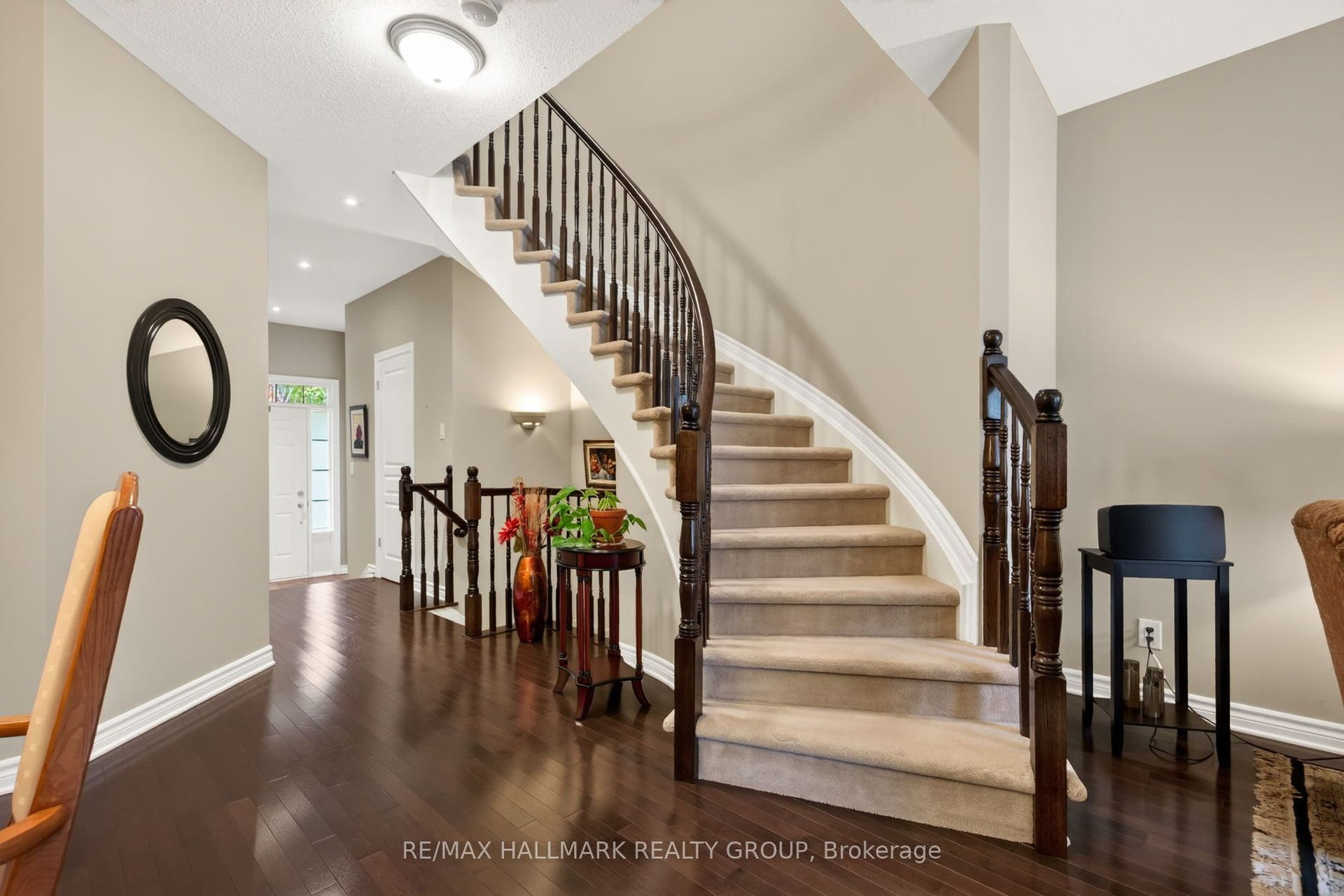 304 Celtic Ridge Crescent, Kanata, Ottawa ON K2W 0B8 beautiful spiral staircase heading upstairs