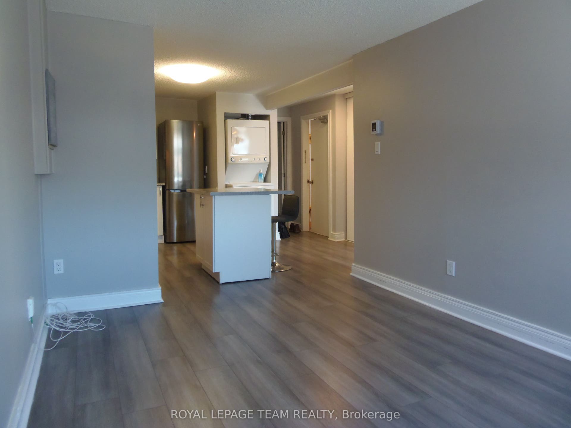 Living room towards entry and bath