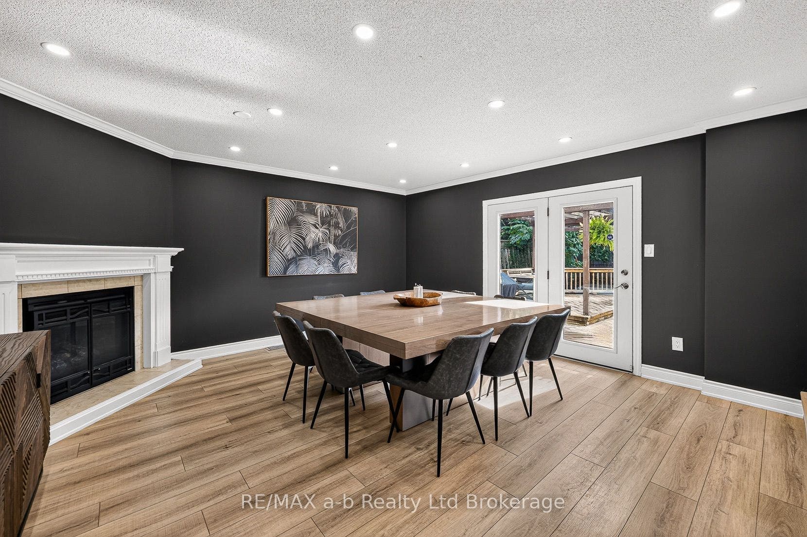 Diningroom with fireplace and access to the deck
