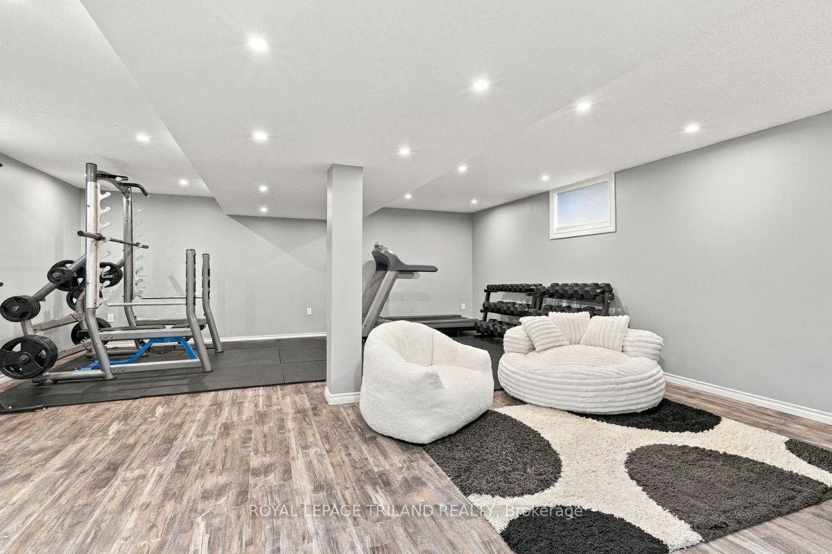 Lower: Finished Basement with Family Room and Gym!