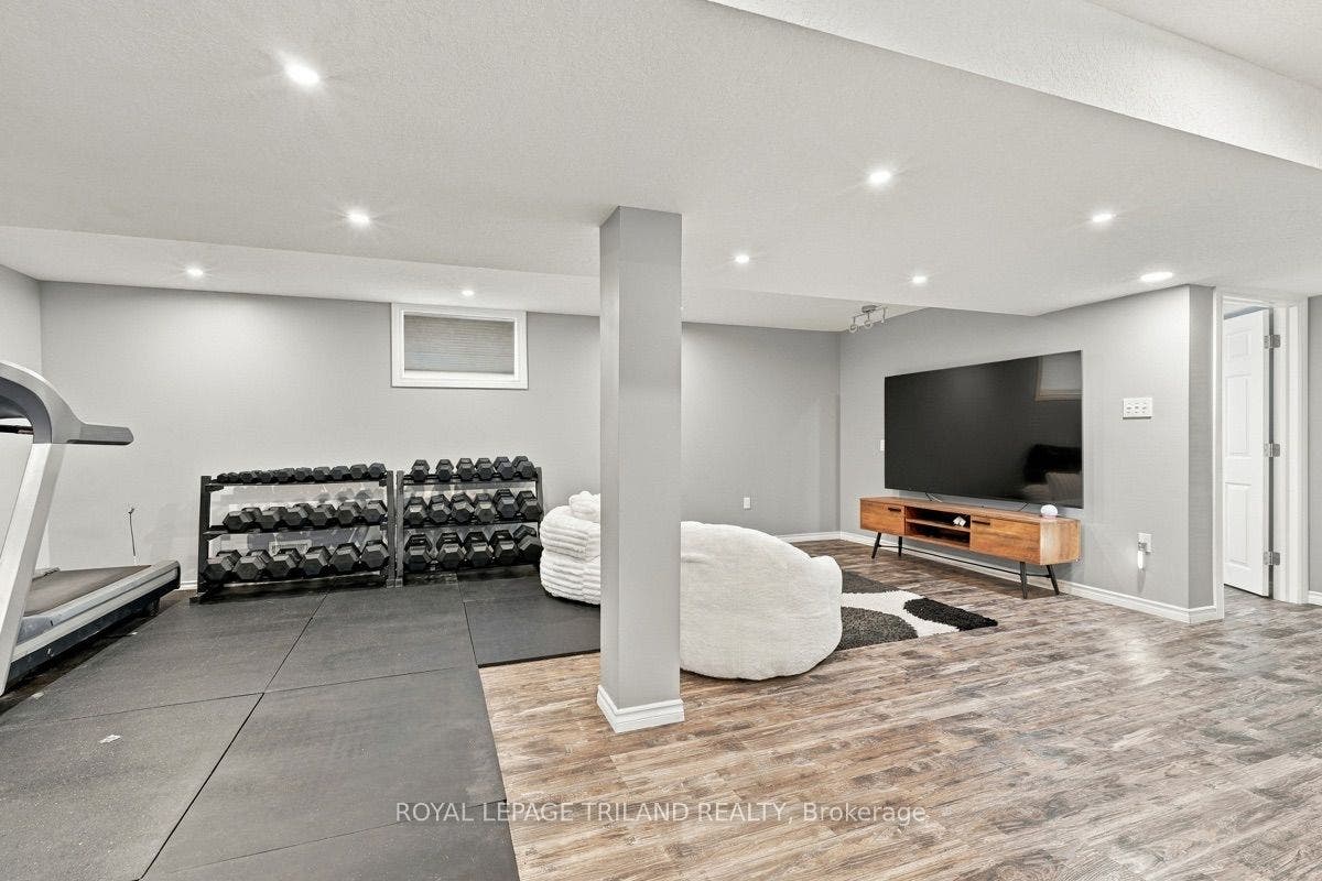 Lower: Finished Basement with Family Room and Gym!