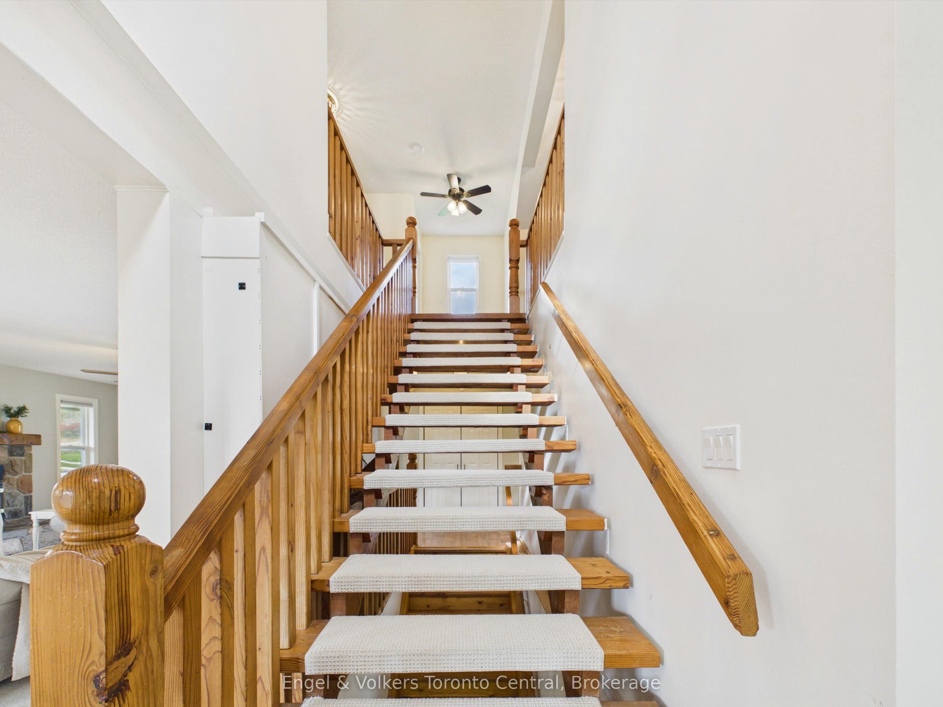 Extra wide staircase leading to upper floor