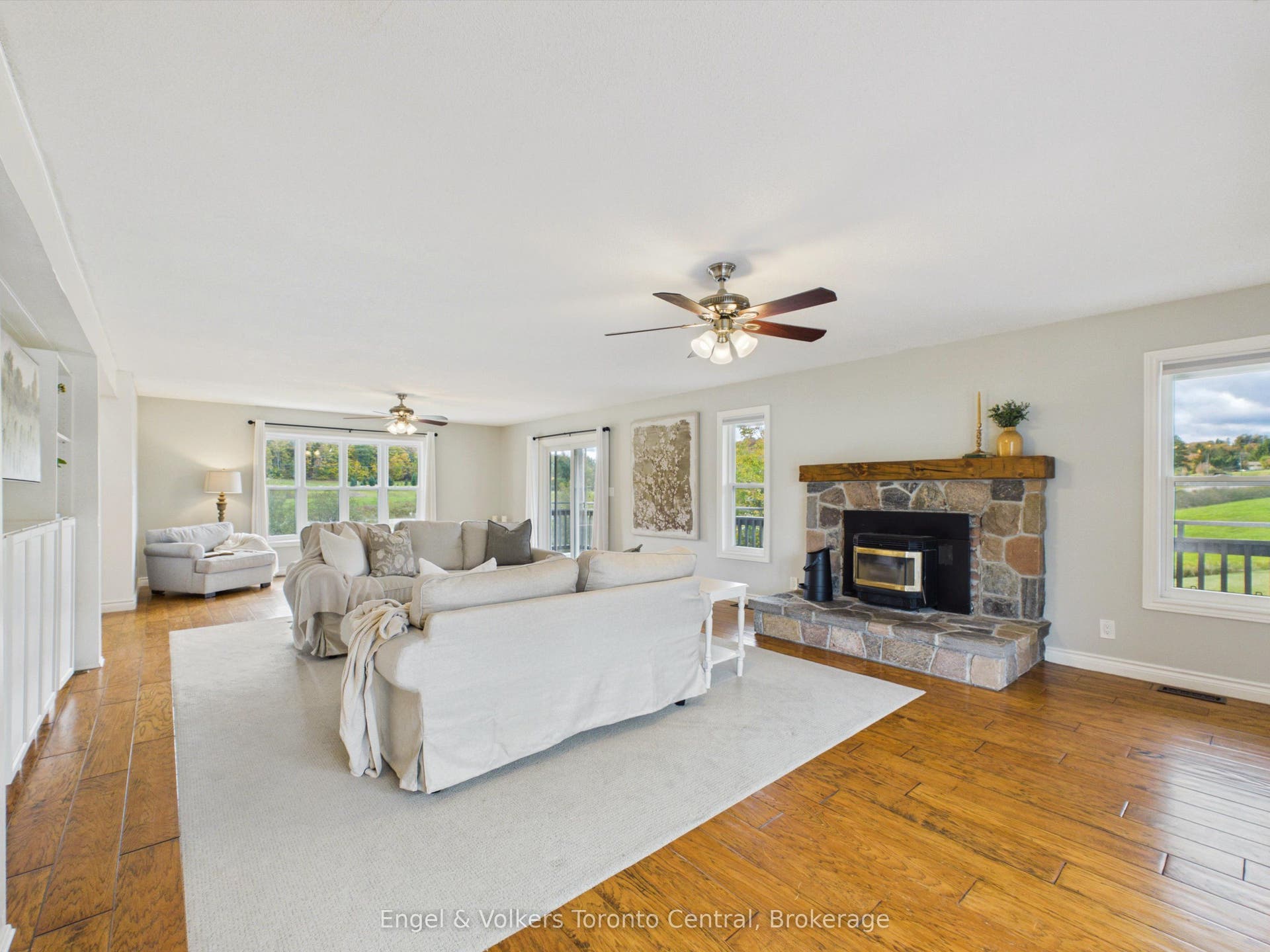 Spacious living room with picturesque fireplace
