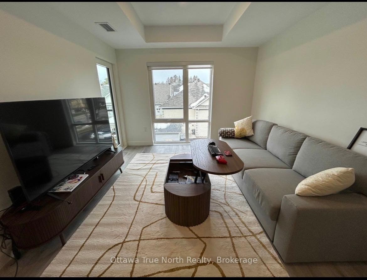 LIVING ROOM WITH LOTS OF SUNLIGHT