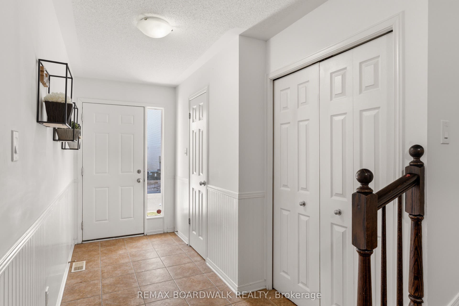 Foyer With Powder Room + Double Closet