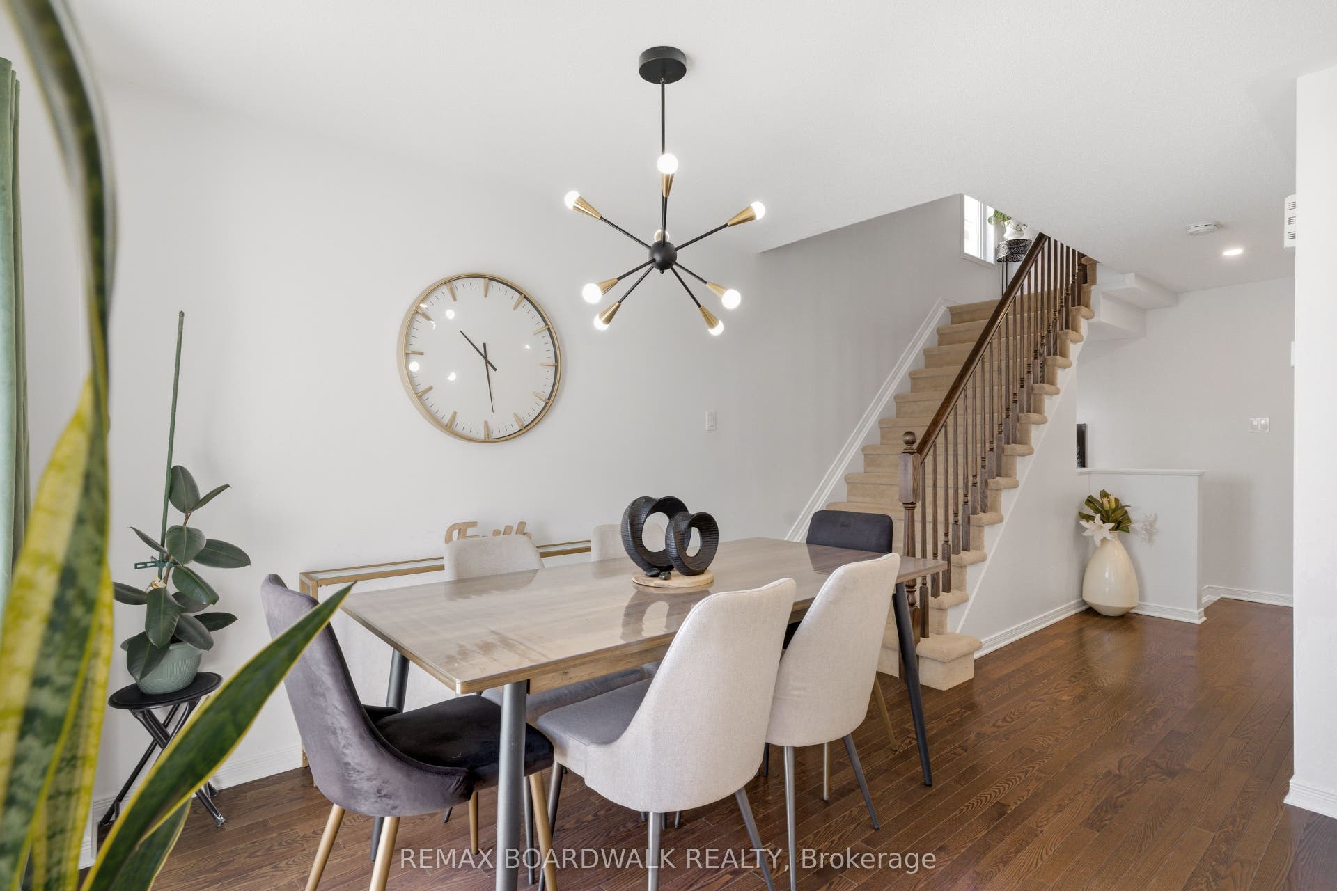 Dining Area With Hardwood Throughout