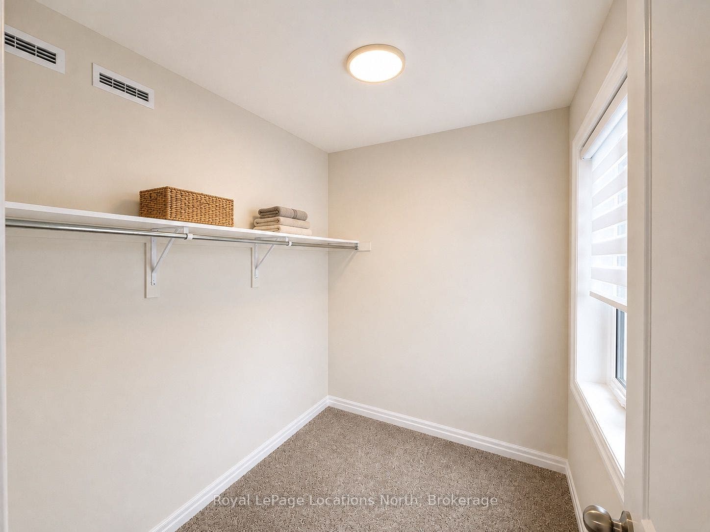 Primary Bedroom Walk in Closet