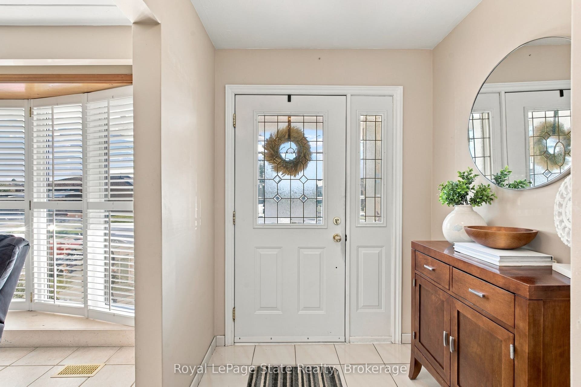 BRIGHT & INVITING entry; says WELCOME HOME!