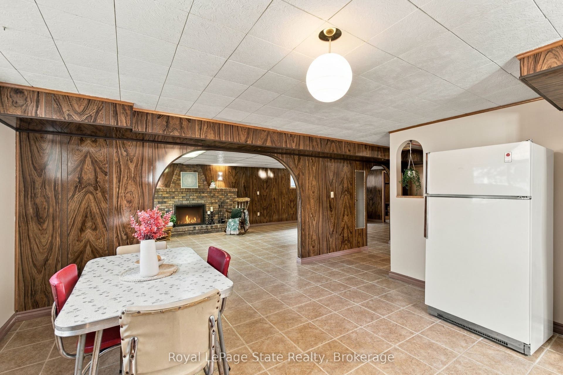 2ND KITCHEN in basement with gas stove & fridge.
