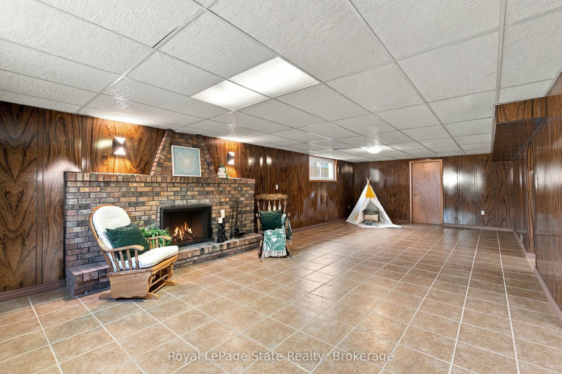 Family room with fireplace is ideal for game nite