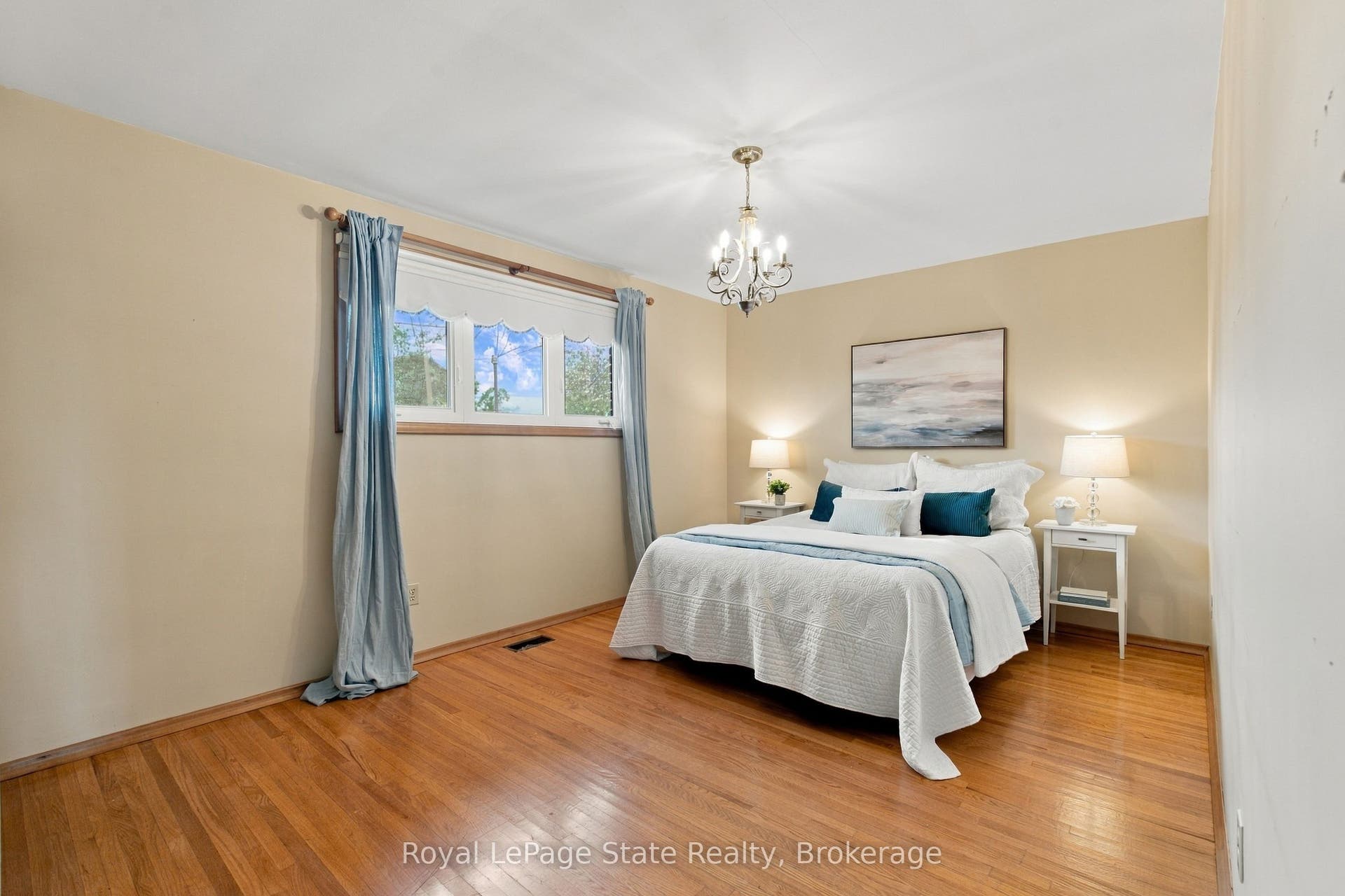 PRIMARY SUITE with double closets & lg window!