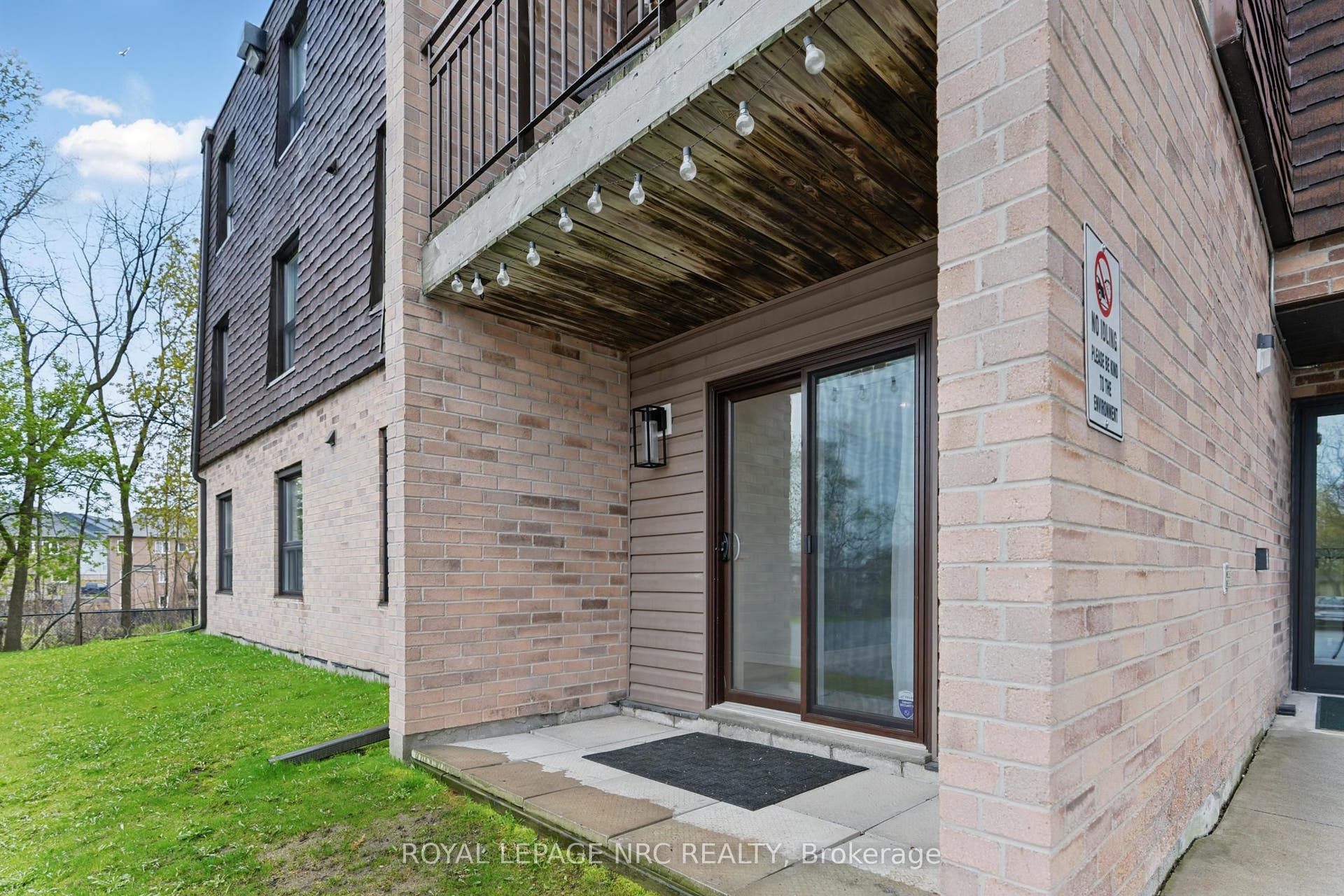 Patio with access to unit from parking lot