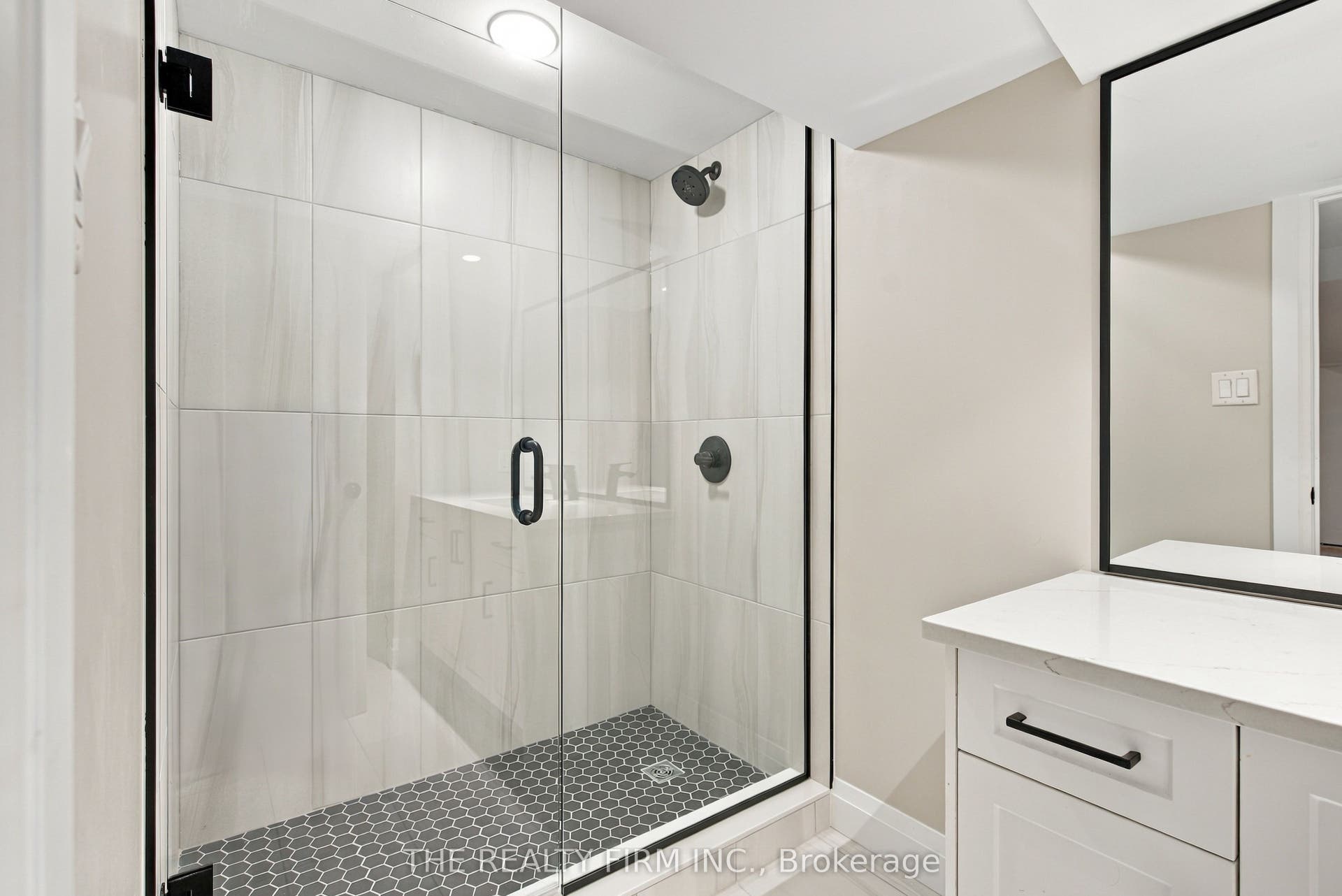 Tiled in glass shower