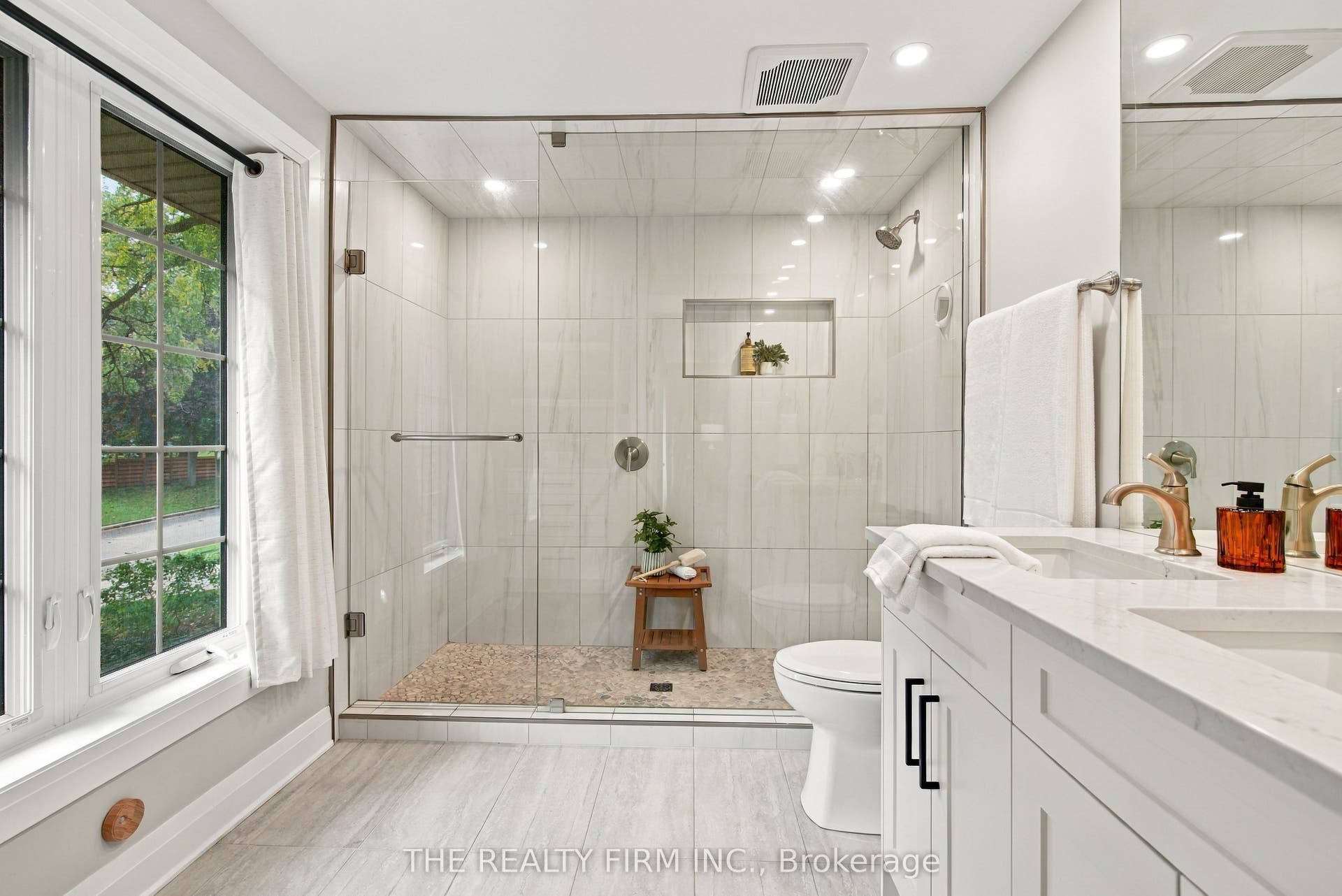 Double vanity ensuite with oversized shower
