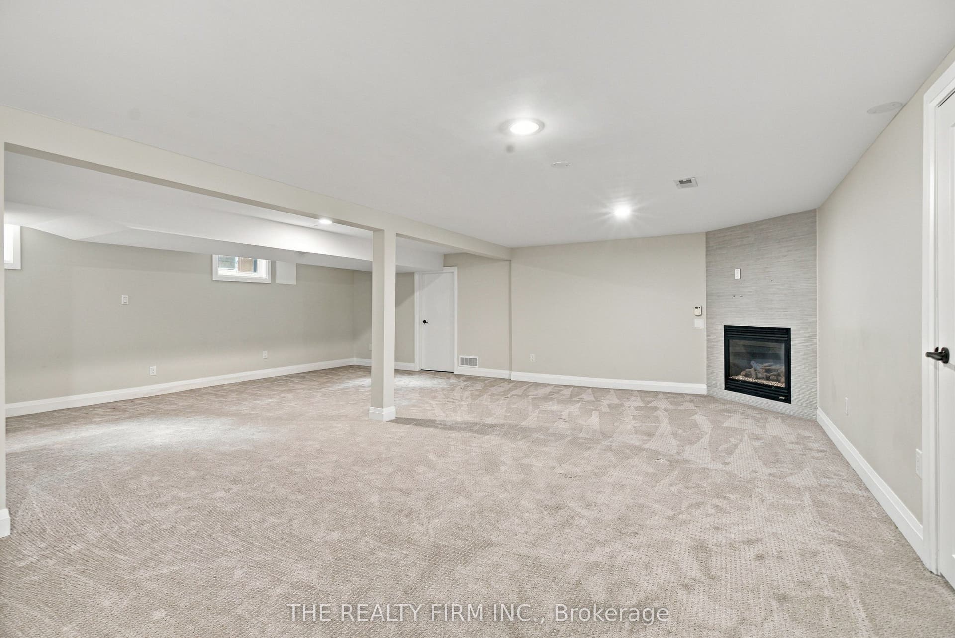 Fully finished basement with gas fireplace