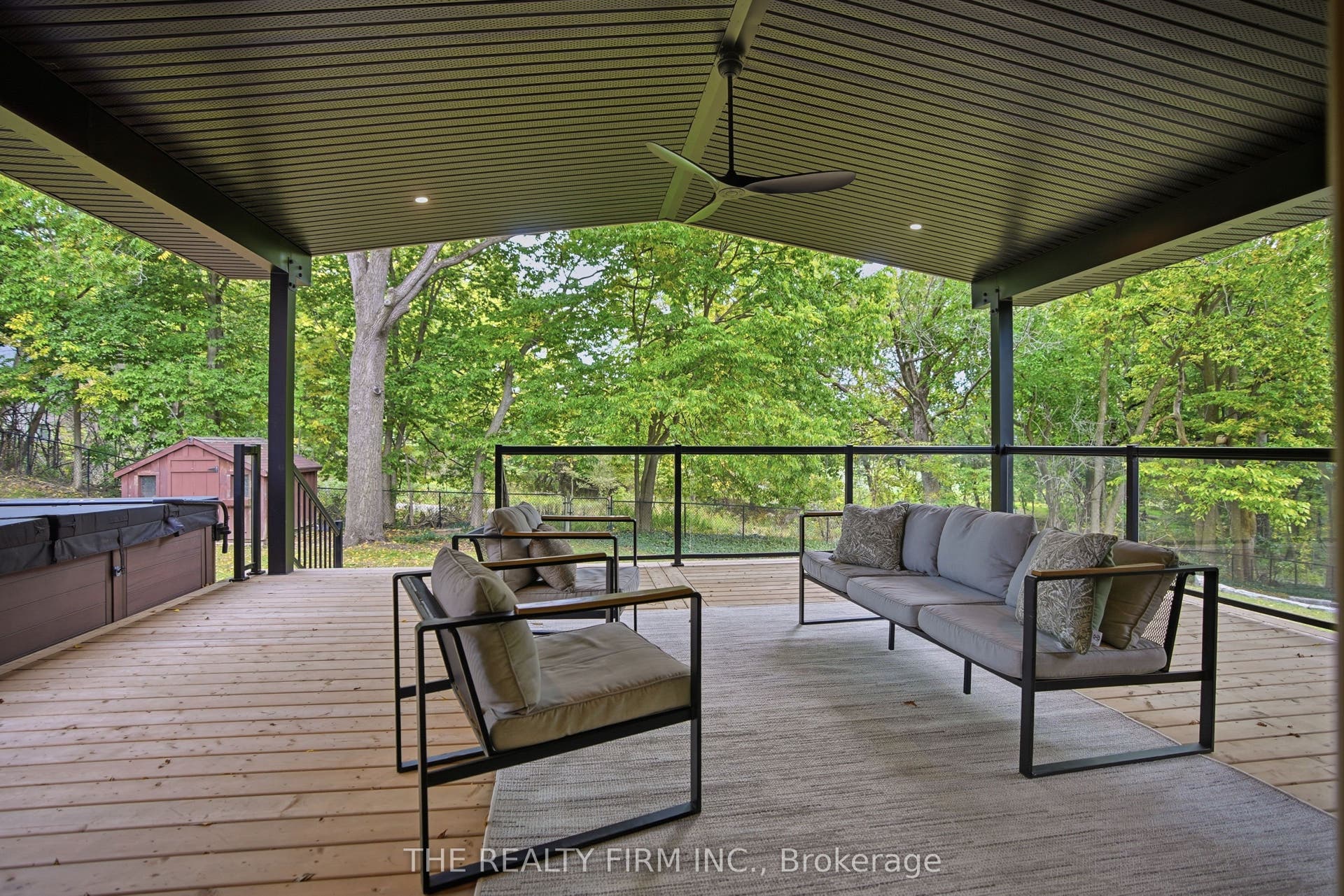 Large rear covered patio w/ fan + gas line for bbq