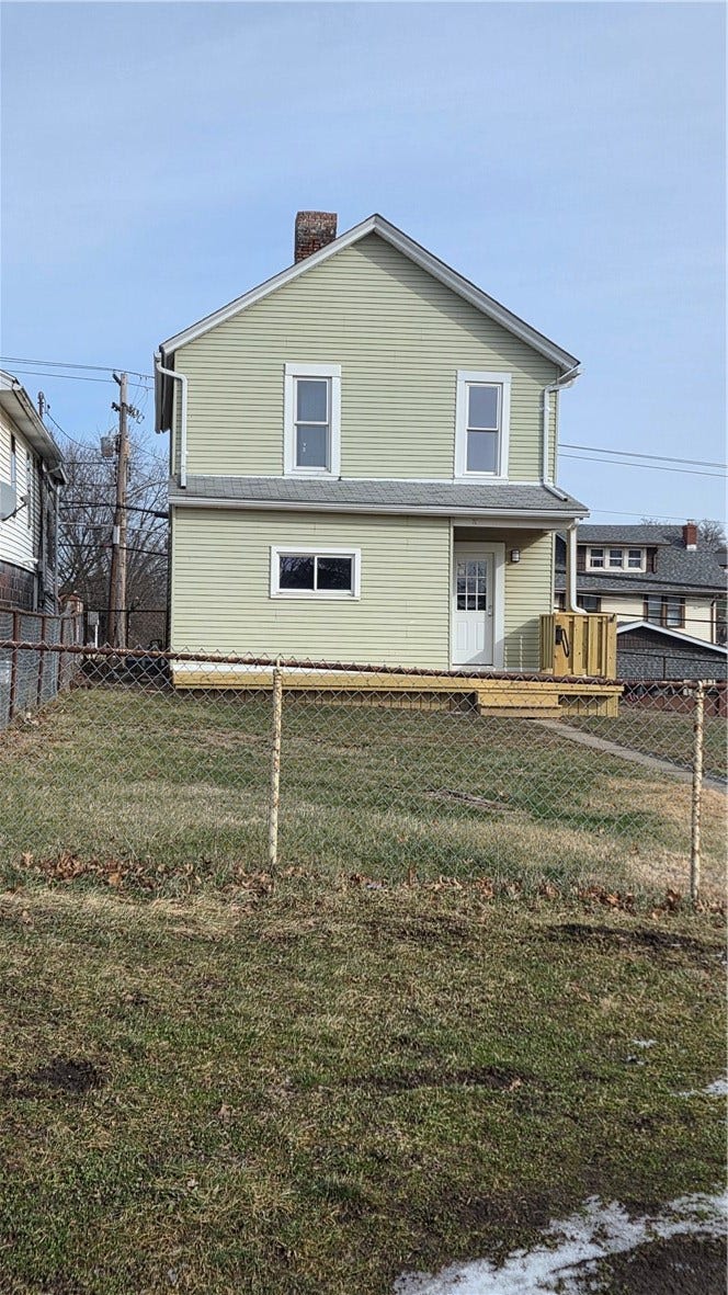 Large, fenced back yard