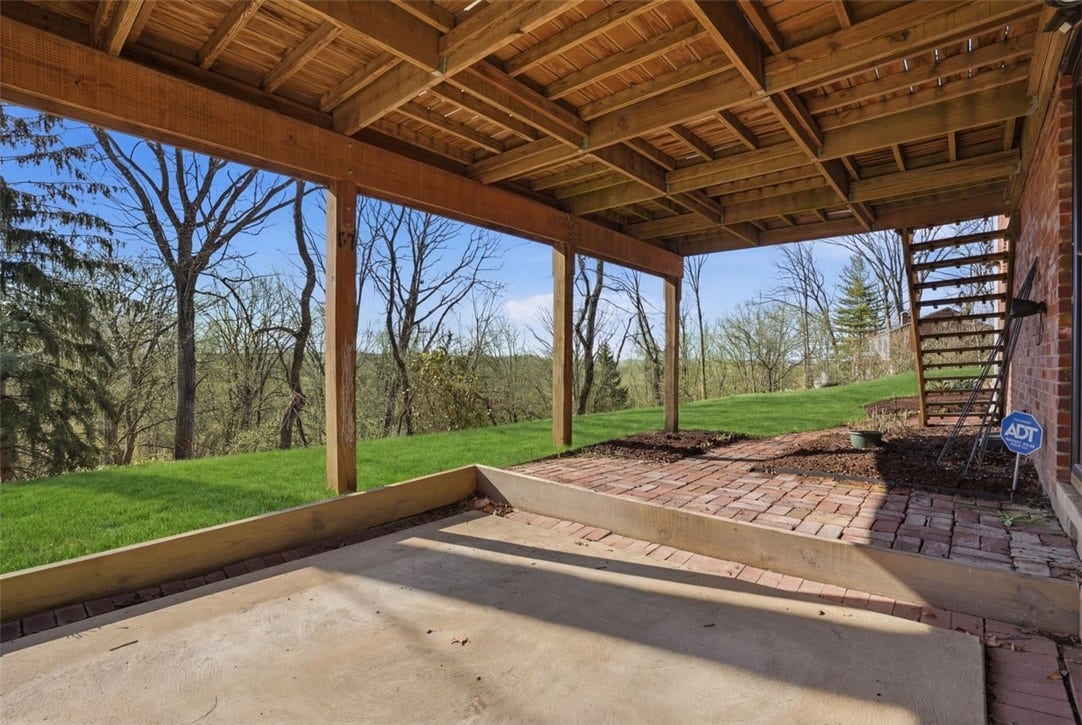 Patio outside with access from lower level or deck