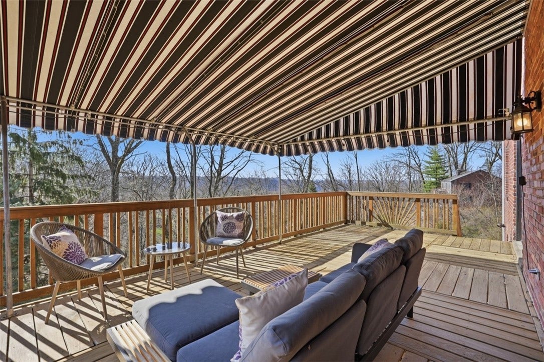 Covered deck off of the family room and kitchen