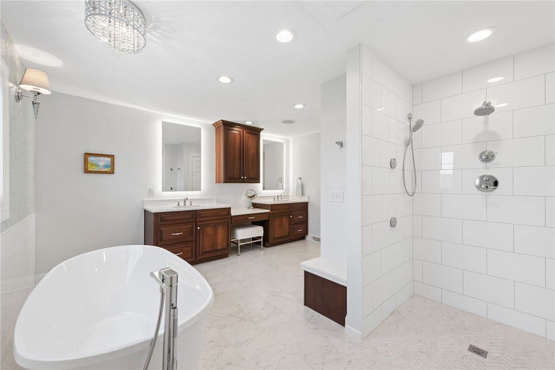 what a fabulous primary bathroom with all the modern features