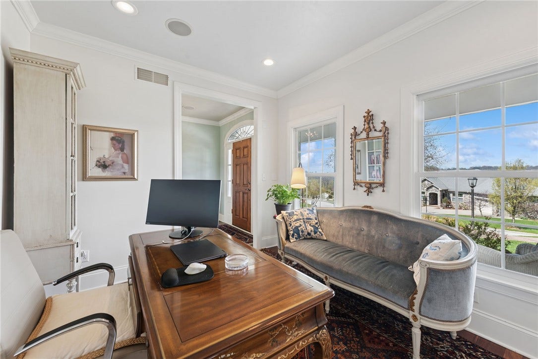 den/office with great views out of the front window which also provides lots of natural lighting
