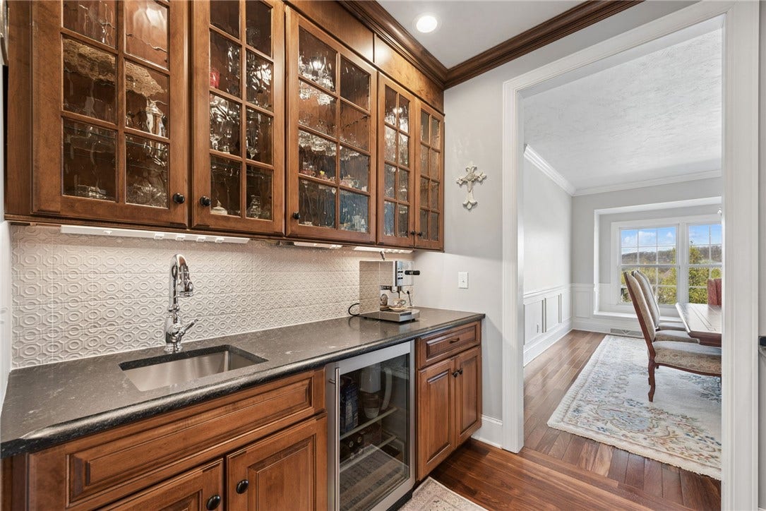 coffee bar with sink, disposal and beverage refrig