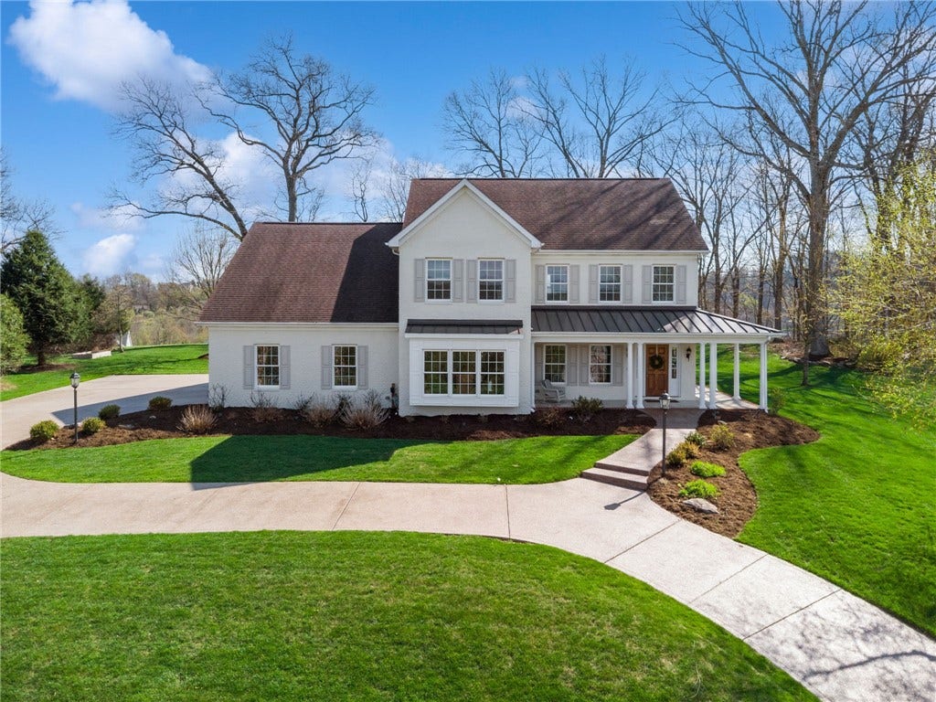 All brick 4 bedroom 3 full 2 1/2 bath home in the East High Acres II Community. Unity Twp