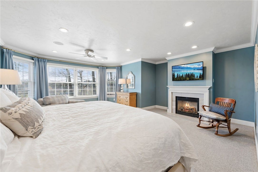primary bedroom with gas fireplace