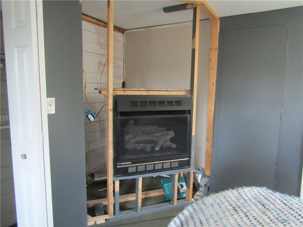 propane fireplace in bedroom