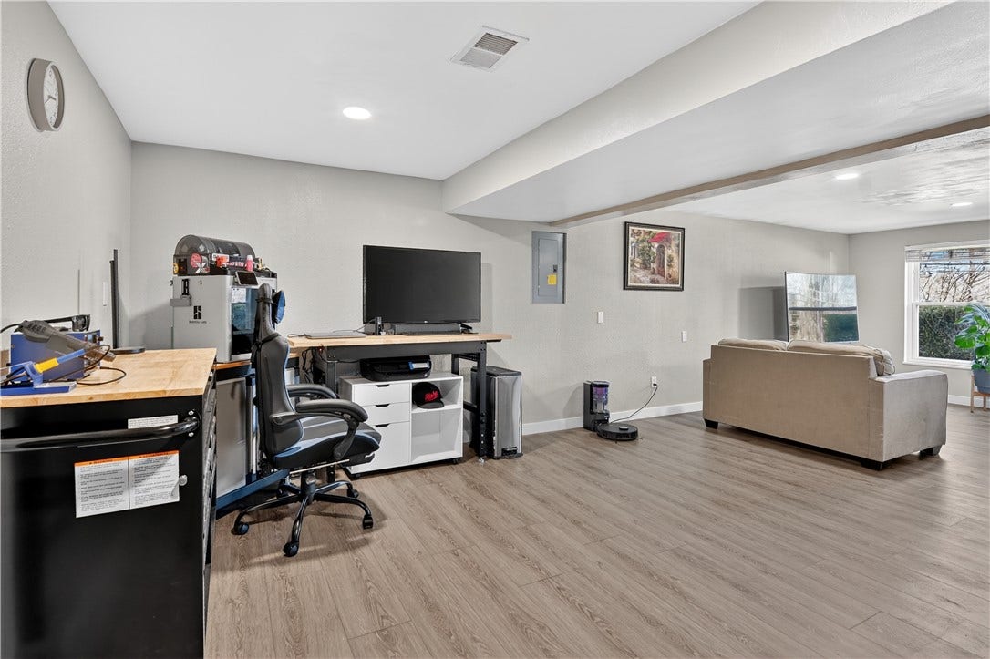 Another view of the office space overlooking part of the family room.