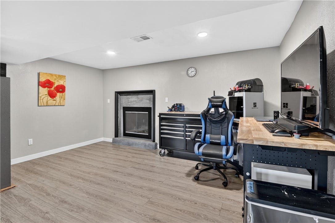 Additional LL space used as an office all with a wood burning fireplace