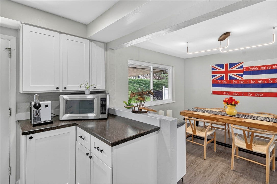 Partial kitchen space into leading into the dining room
