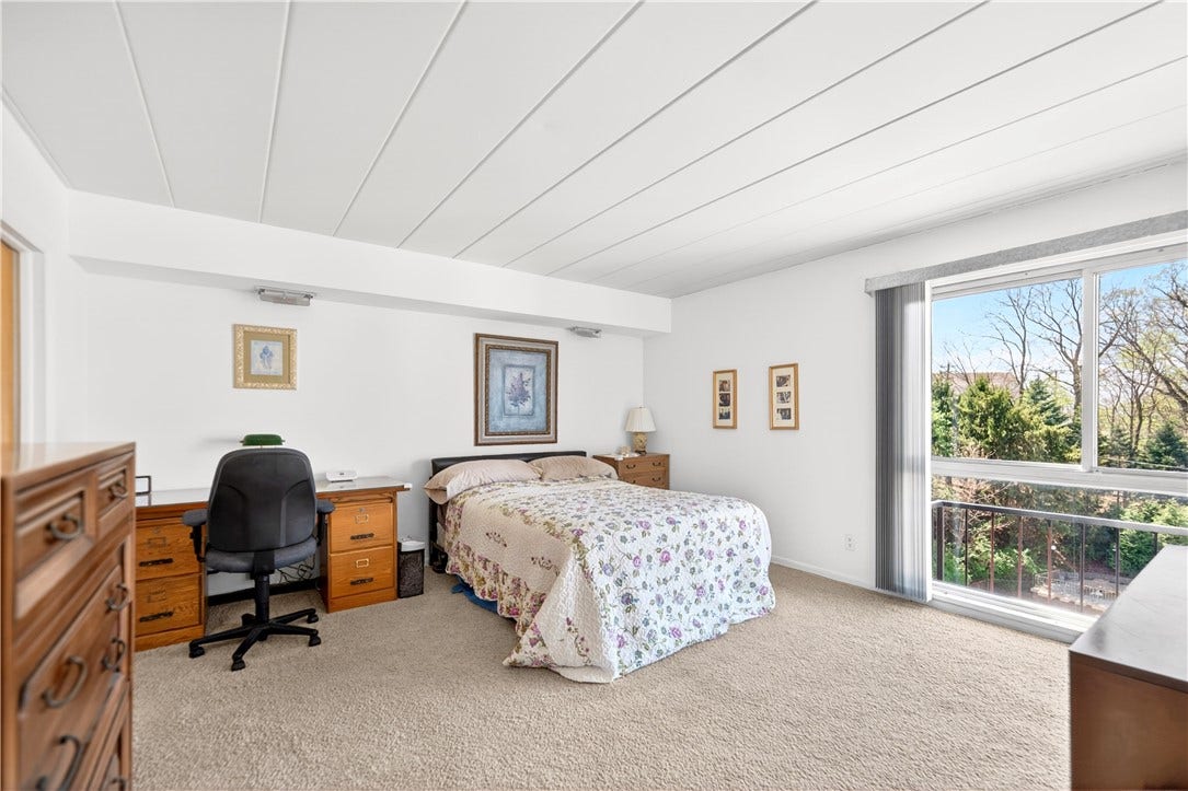 Primary bedroom with extra windows