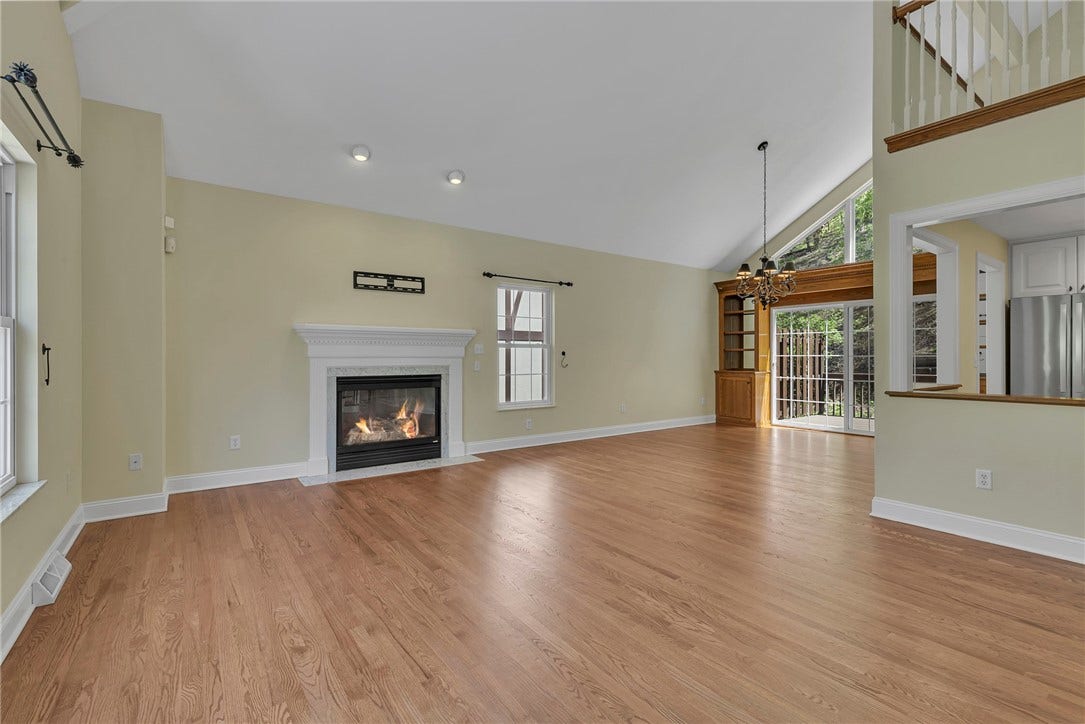 Gas log fireplace adds comfort to the oversized living/dining room and leads to the back yard.