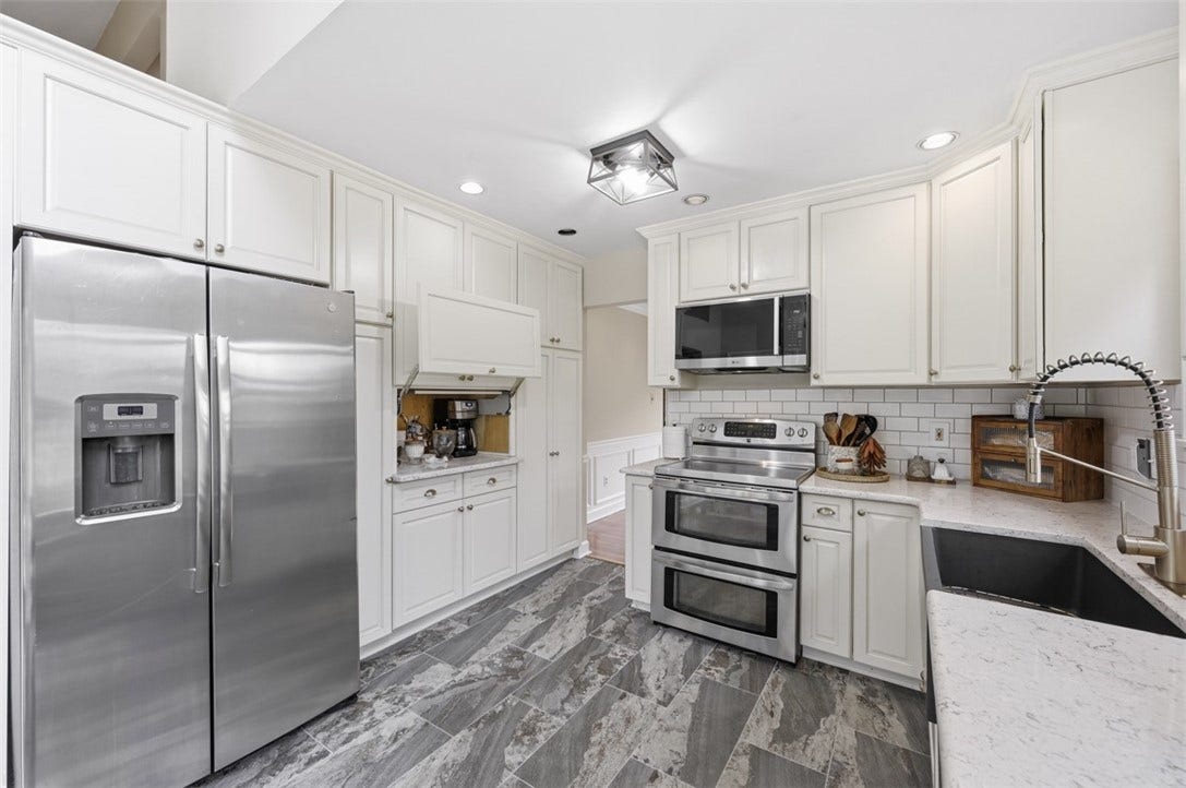 Appliance garage easily tucked away