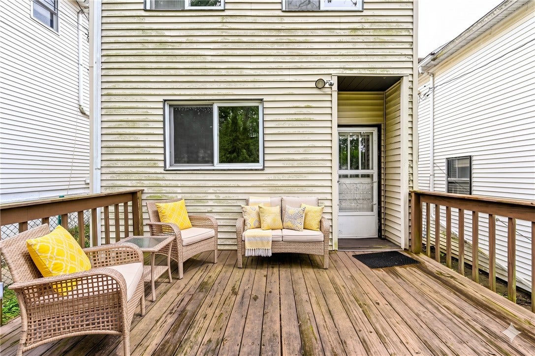 STAGED DECK. THE DECK IS RIGHT OFF THE KITCHEN