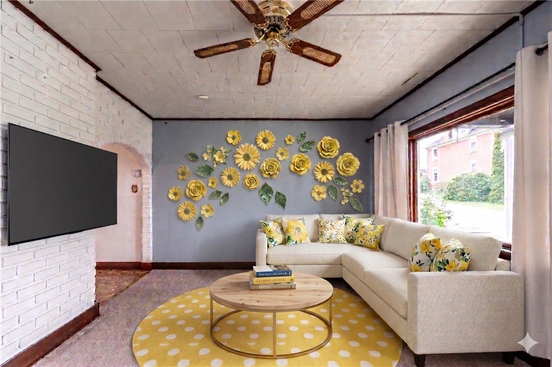 STAGED LIVING ROOM. CHECK OUT THE WINDOW THAT PROVIDES NATURAL LIGHT