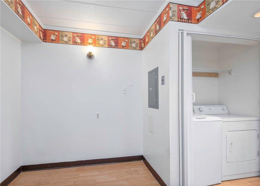 Laundry closet area.