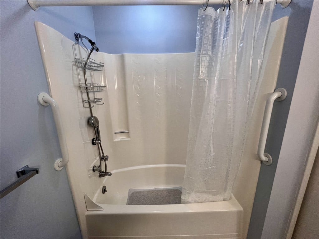 Tub with Hand Held Shower
