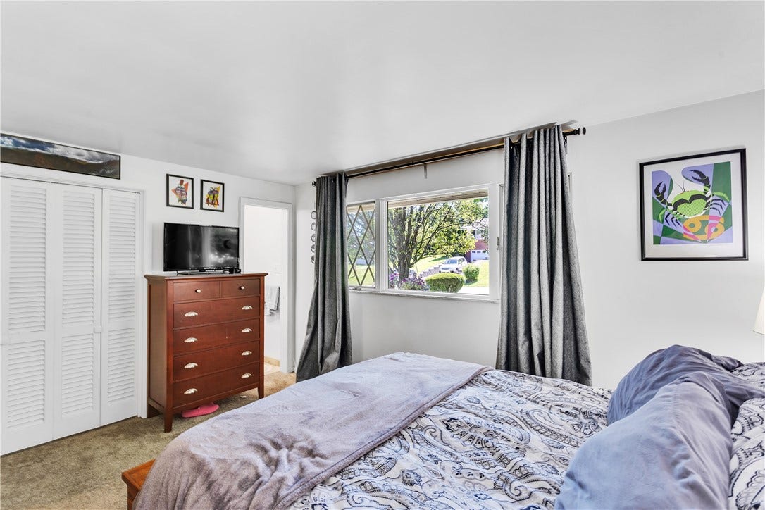 Large Lighted Closet and en Suite Private Bath in the Primary Bedroom.
