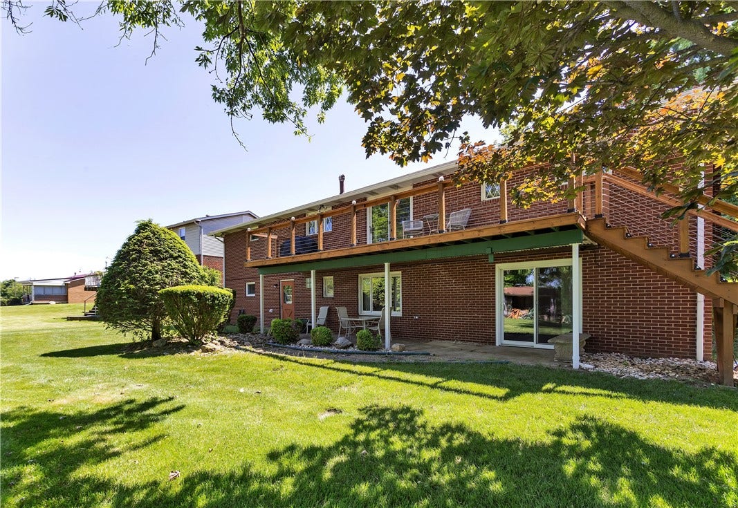 Fabulous Deck Off Main Level Dining Area with Steps to Yard, PLUS Finished Living Space w/Slider and Separate Entry on the Walkout Lower Level.