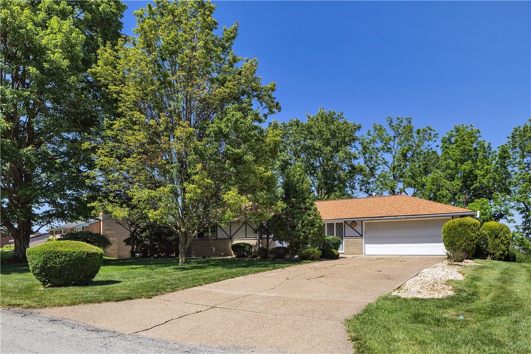 All Brick and Stone with 3 Bedrooms, 2 Full Baths on the Main Huge Finished Lower Level with 3rd Full Bath!