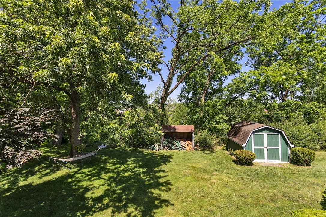 Open Wood Storage Shed and Storage Shed with Skylight.