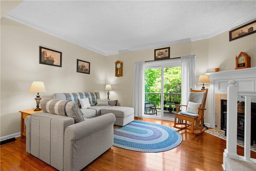 The sliding door in the living room leads to the deck