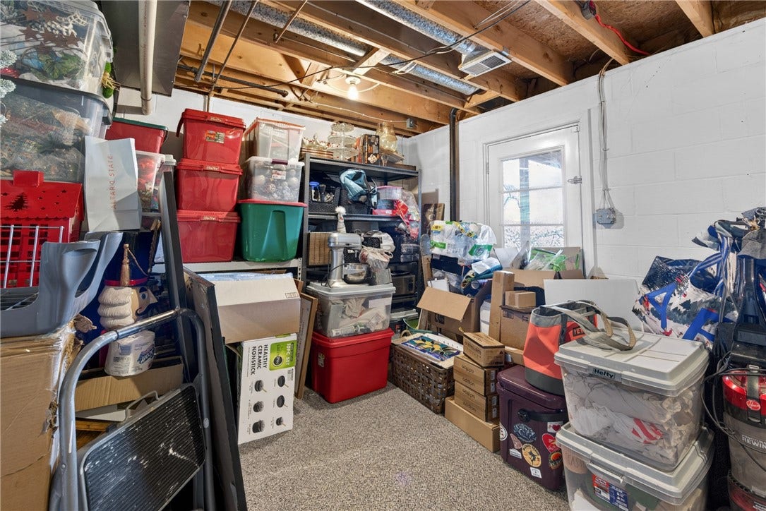 Storage/utility room with door to patio.  Secondary laundry hook-ups here also.