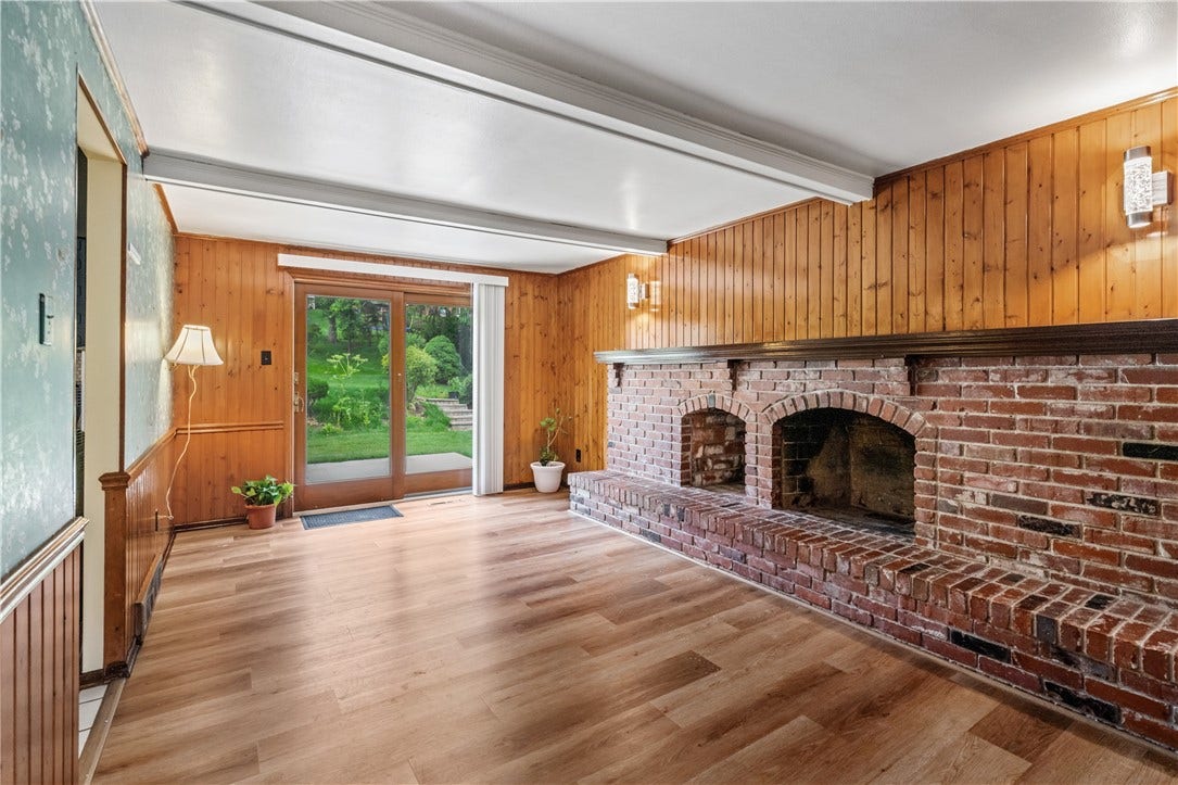 family room with wood burn fireplace