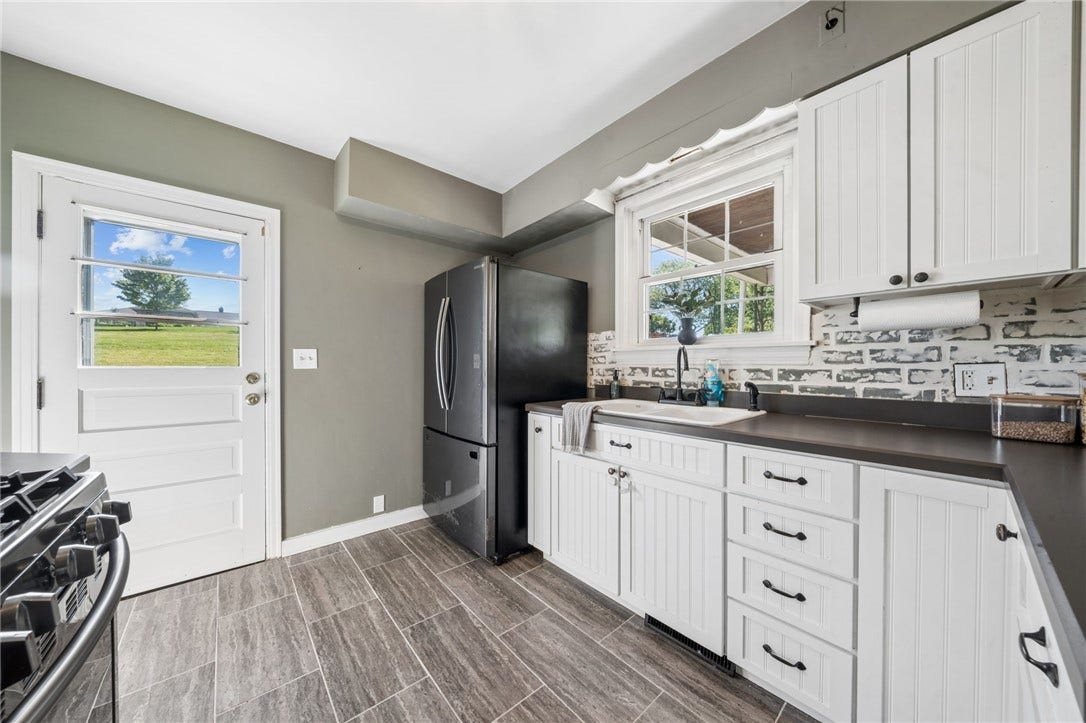 Door off kitchen to back porch
